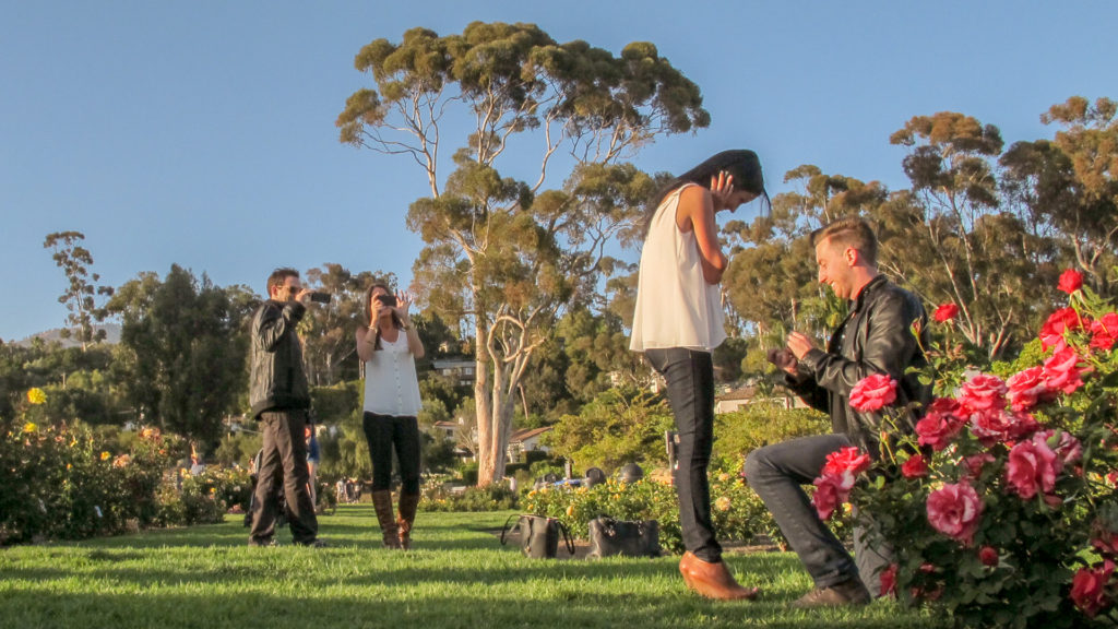 Man kneels to propose to girlfriend